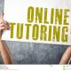 man-holding-banner-online-tutoring-title-conceptual-image